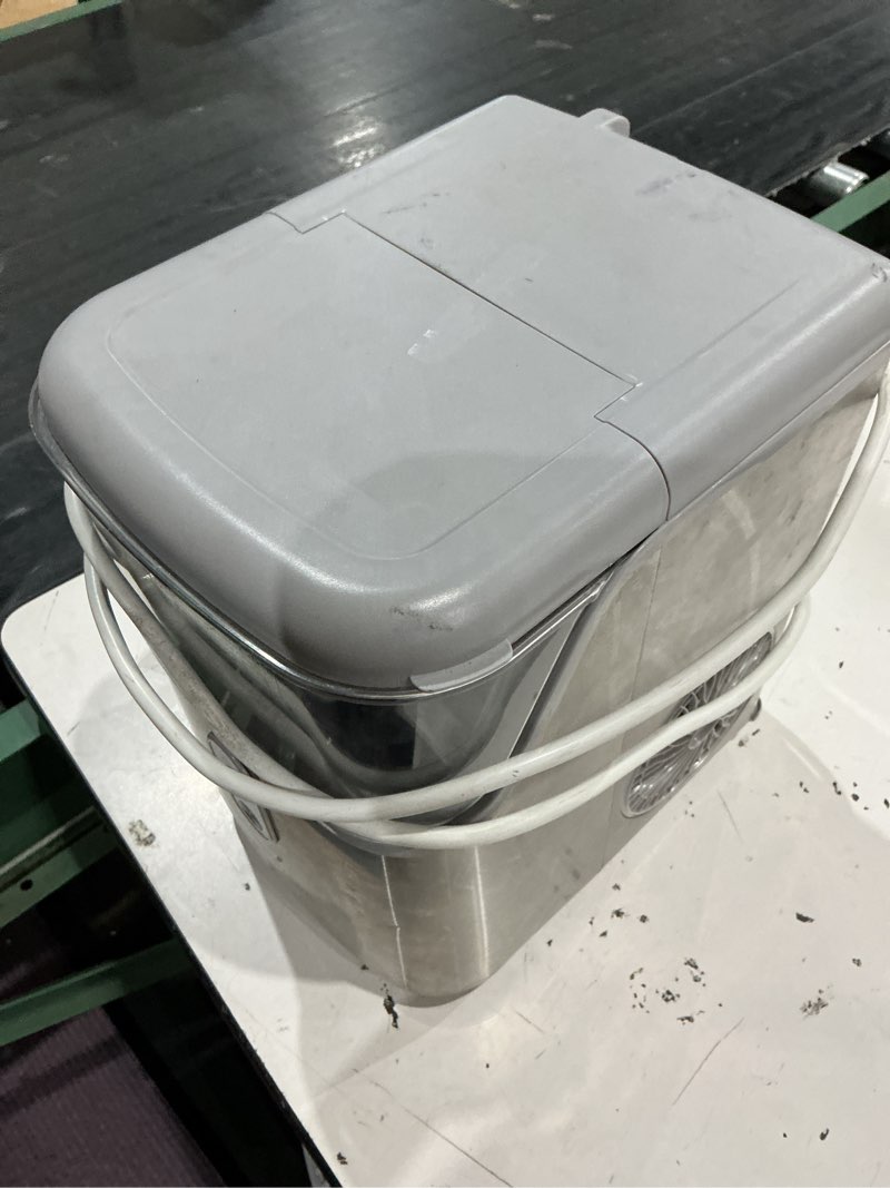 Condition photo showing As Is for frigidaire 33-lb ice per day portable/countertop nugget ice maker ( stainless steel )