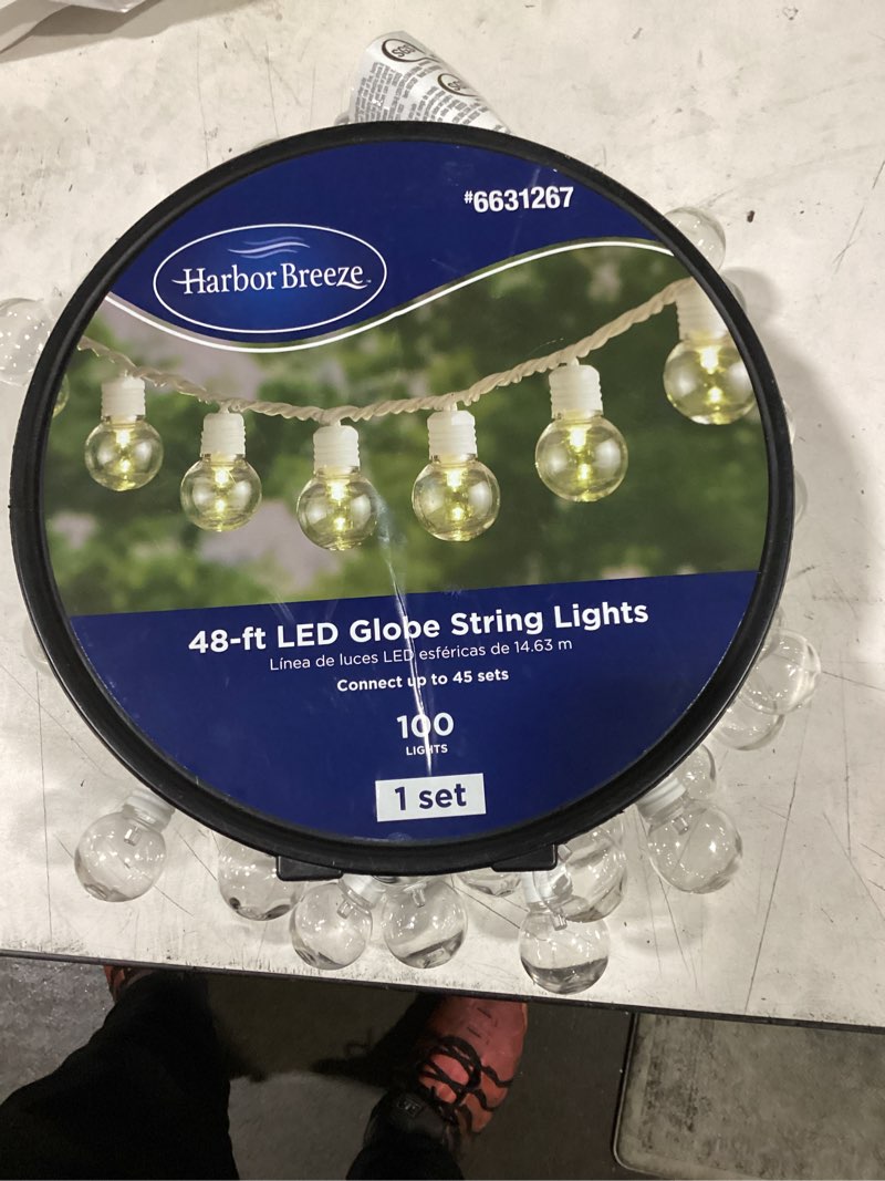 Condition photo showing As Is for harbor breeze 48-ft plug-in white indoor/outdoor string light with 100 white -light led globe bulbs