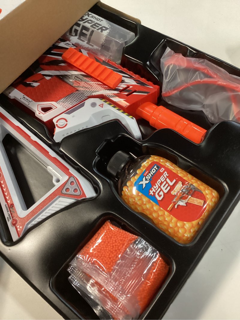 Condition photo showing New/Like New for XSHOT Hyper Gel Trace Fire Blaster, Semi and Fully Automatic Gel Blaster & 10,000 Gellets, 600 Capacity Hopper & 850 Capacity Mag, Ages 14 & Up by ZURU