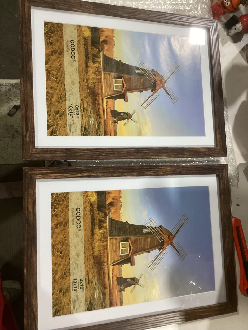 Condition photo showing Good Condition for 10x14 Picture Frame Set of 2, 10 x 14 Wood Photo Frames with Mat for 8x12, Natural Wooden Frame with Real Glass Cover for Wall and Tabletop Display,Brown Brown 10x14-2Pack