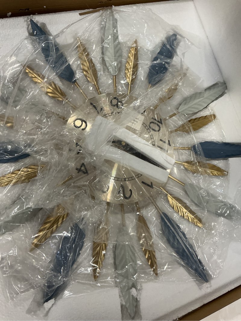 Condition photo showing Good Condition for Lafocuse 23 Inch Silent Large Wall Clock for Living Room Décor, Decorative Mid Century Wall Clock, Sunburst Starburst Wall Clocks Battery Operated, Modern Art Deco Colorful