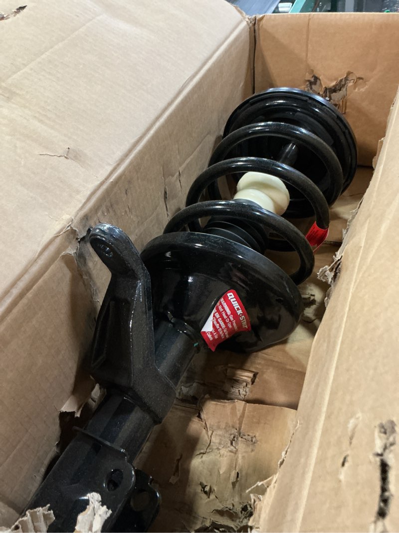 Condition photo showing As Is for monroe quick-strut 172135 suspension strut and coil spring assembly for honda element