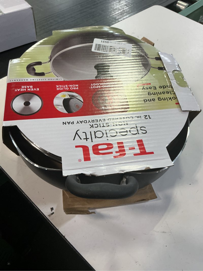 Condition photo showing As Is for t-fal b36282 nonstick deep covered everyday pan with ergonomic stay-cool handles cookware, 12-inch, black 5 quarts nonstick