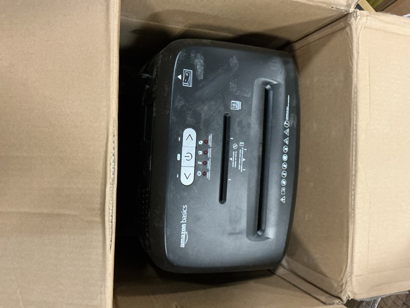 Condition photo showing As Is for Amazon Basics 18 Sheet Cross Cut Paper, CD, and Credit Card Shredder, Black 18 Sheet Black