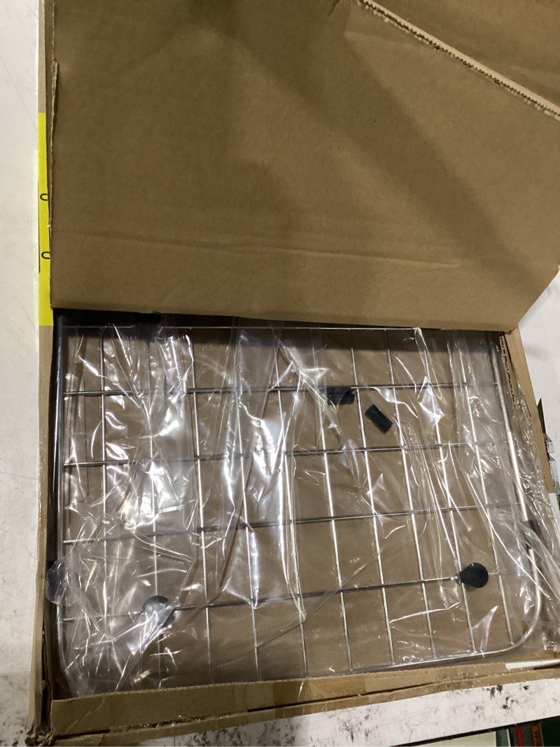 Condition photo showing New/Like New for serene valley sink bottom grid 24-1/8" x 12-5/8", centered drain with corner radius 1-1/2", sink protector nlw2412c