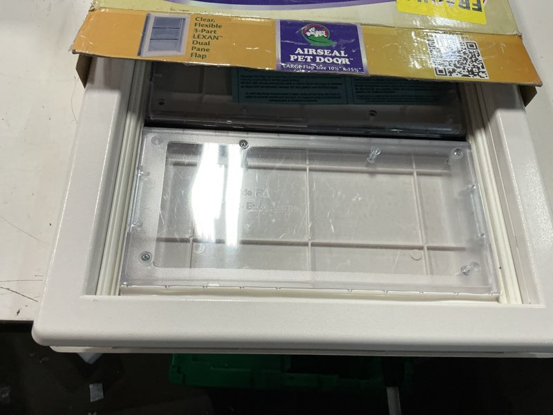 Condition photo showing Good Condition for ideal pet products air seal pet door with telescoping frame, large, 10.25" x 15.75" flap size large - 10.25" x 15.75" flap size