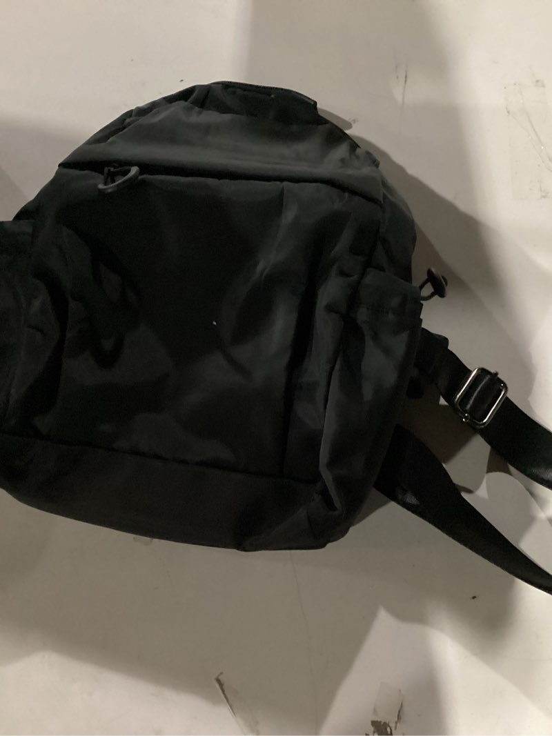 Condition photo showing New/Like New for evancary small sling bag for women men, sling backpack chest daypack crossbody bag for travel outdoor hiking dark black