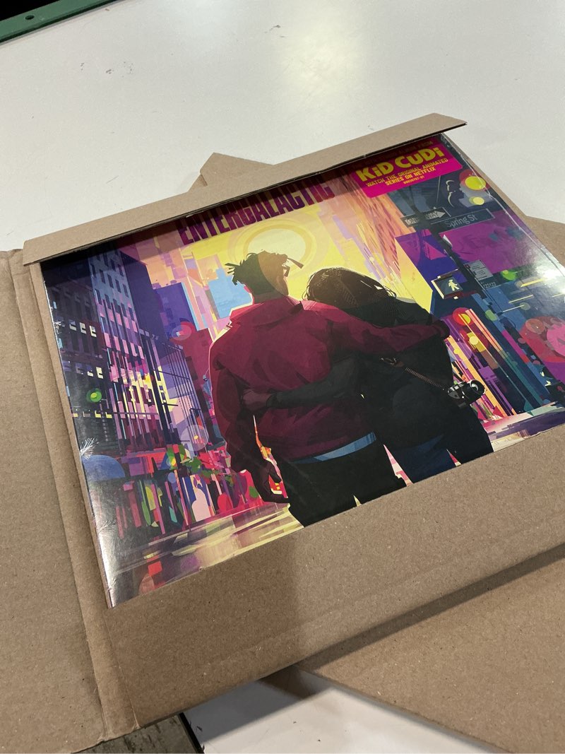 Condition photo showing New/Like New for kid cudi entergalactic record