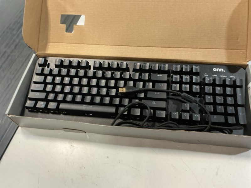Condition photo showing Good Condition for onn gaming mechanical keyboard with blue switches, adjustable 16.8m led lighting, 104 keys, black