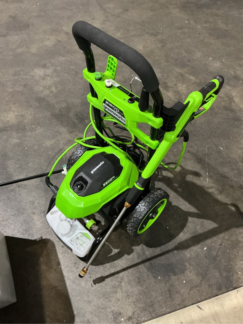 Condition photo showing As Is for greenworks 2200-psi 1.2-gpm cold water electric pressure washer with 4 spray tips