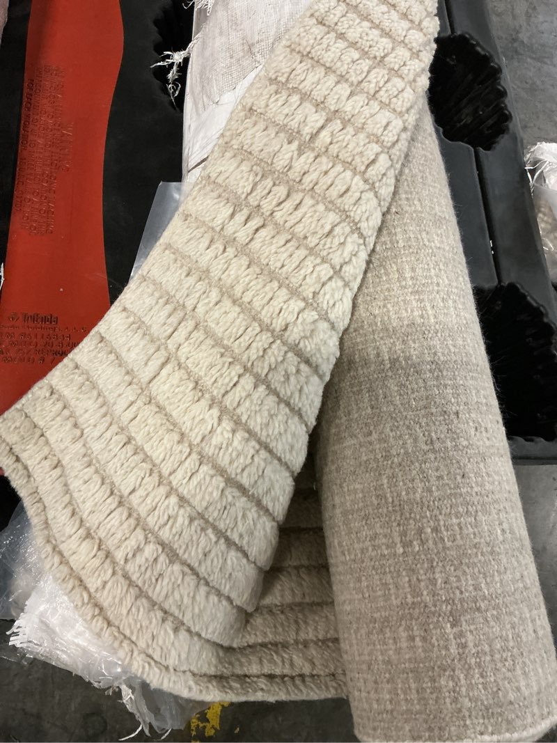 Condition photo showing As Is for remington hand-loomed wool rug 9' x 12'