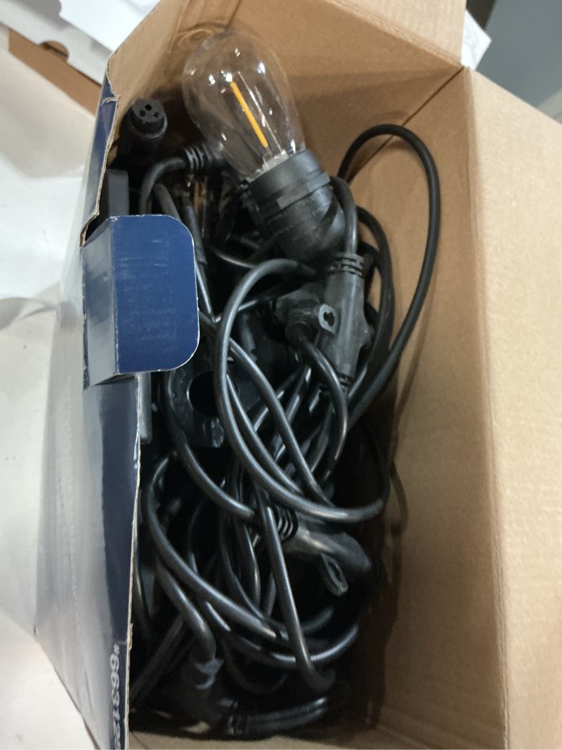 Condition photo showing As Is for harbor breeze 48-ft solar black indoor/outdoor string light with 20 white -light led edison bulbs