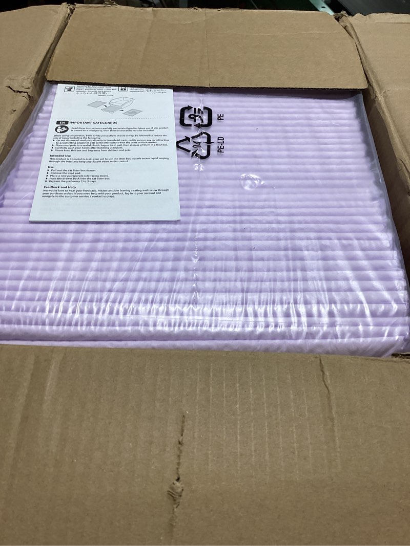 Condition photo showing Good Condition for amazon basics cat pee pads, super absorbent, odor control with fresh scent, universal fit for litter box, multi cat, disposable, white/purple, 100 count