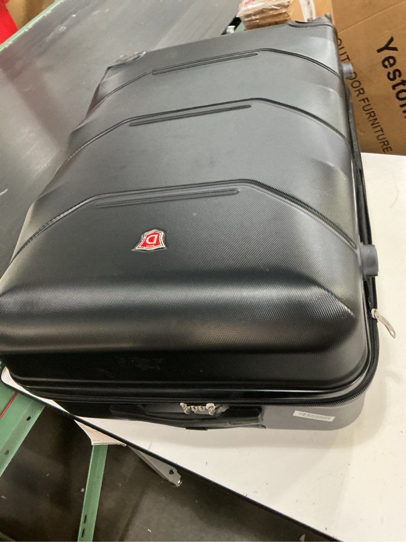 Condition photo showing As Is for dukap zonix 26\" hardside suitcase, 4-wheeled spinner, tsa checkpoint friendly, black (dkzon00m-blk)