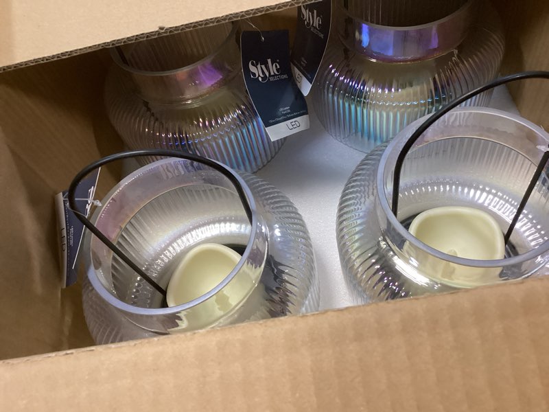 Condition photo showing New/Like New for Style Selections 7.28-in x 9.84-in clear Glass LED light Outdoor Decorative Lantern