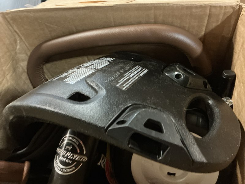 Condition photo showing As Is for radio flyer city 4-in-1 stroll 'n trike, black, for riders 1-5 years old, 4 riding modes, 3 point harness with comfort pad, parent controlled steering, rear storage, stroller tricycle for toddlers