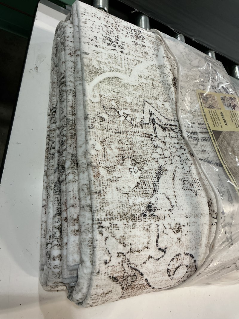 Condition photo showing Good Condition for washable area rug 9'x12' retro floral khaki boho design non-shedding easy care ideal for high traffic areas in living room bedroom office coffee table kitchen large carpet floral khaki 9' x 12' (rectangular)