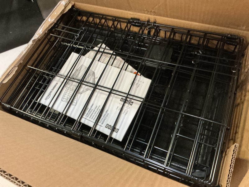 Condition photo showing Good Condition for amazon basics durable, foldable metal wire dog crate with tray, single door, 18 x 12.4 x 15 in, black 18.0"l x 12.4"w x 15.0"h single door no divider