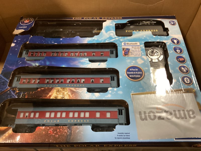 Condition photo showing New/Like New for Lionel The Polar Express Battery O Gauge Toy Train Set with Remote, Locomotive, Train Cars, & Track with Authentic Train Sounds, Lights, & Water Vapor Smoke Effects for Kids 4+
