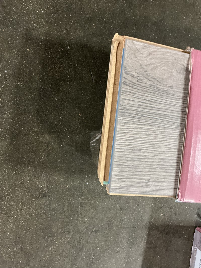 Condition photo showing As Is for select surfaces pearl gray spilldefense laminate, 16.45 sq. ft. per box