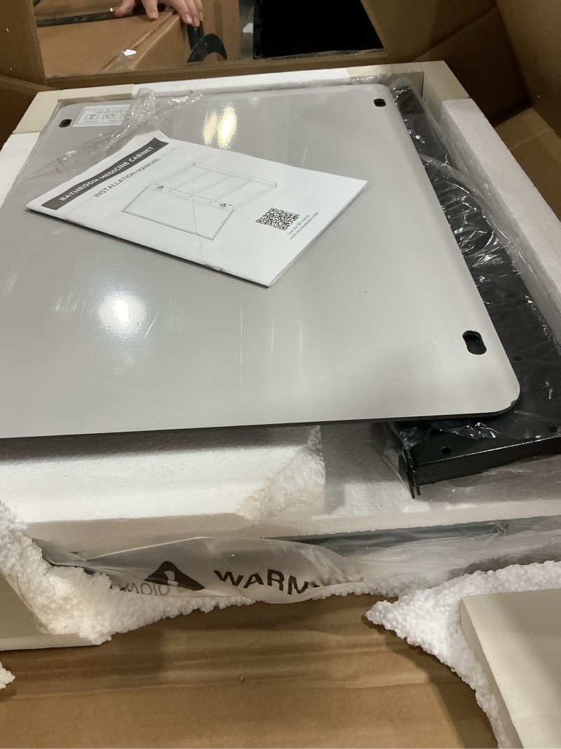 Condition photo showing New/Like New for TokeShimi 24 x 24 Medicine Cabinet Mirror, Assembly Required, Black Mirror Medicine Cabinet for Bathroom, Beveled Aluminum Frame, Stepless Adjustable Shelves, Tempered Glass Black 