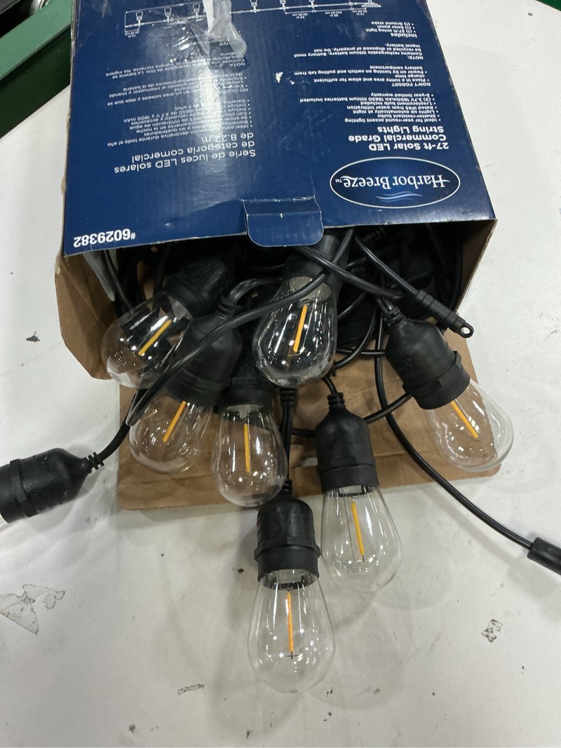 Condition photo showing As Is for harbor breeze 27-ft solar black indoor/outdoor string light with 10 white -light led edison bulbs