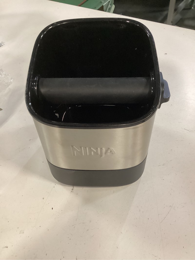Condition photo showing As Is for ninja luxe café knock box, accessories for espresso machine, easy & mess-free puck disposal, coffee & espresso grounds, non-slip base, removable bar, holds 10 double shot pucks, xskknockbox knock box (black) luxe café pro accessory