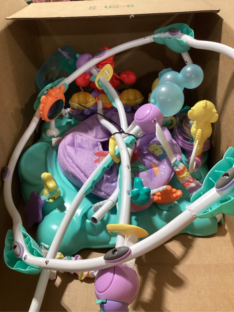 Condition photo showing Good Condition for Bright Starts Disney The Little Mermaid Sea of Activities Baby Activity Jumper with Interactive Toys, Lights & Music with Disney Princess Ariel, 6-12 Months (Blue)