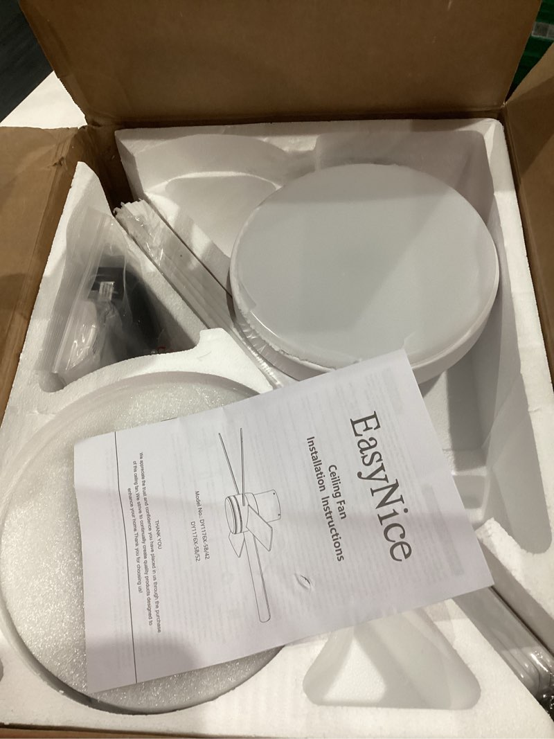 Condition photo showing item condition for 42 Inch White Ceiling Fan with Light, Flush Mount and Remote Control, Dimmable 3-Color Temperature LED, 6-Speed Reversible DC Motor, 5-Blade Modern Design for Indoor or Outdoor White 42 Inch