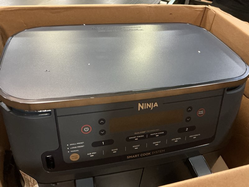 Condition photo showing Good Condition for ninja foodi air fryer w/smart cook thermometer | 6-in-1 air fry, roast, bake, dehydrate & more | dualzone™ match cook & smart finish, 2 independent baskets | xl 10 qt, stainless steel | grey,dz550gy 10qt w/thermometer grey