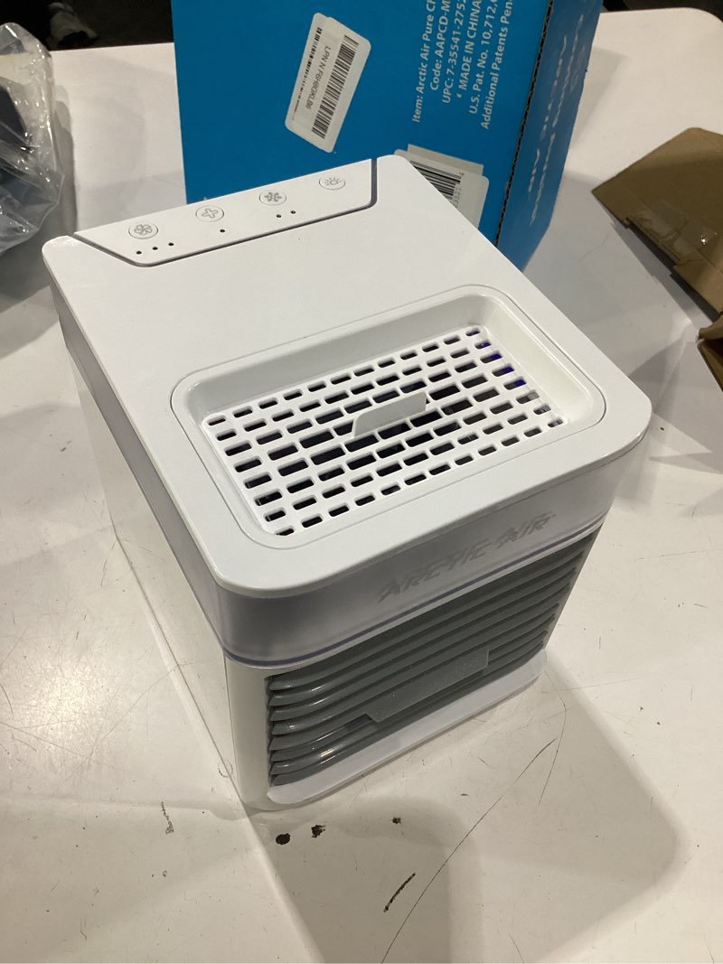 Condition photo showing As Is for arctic air pure chill 2.0 evaporative air cooler by ontel - powerful, quiet, lightweight and portable space cooler with hydro-chill technology for bedroom, office, living room & more,blue no size
