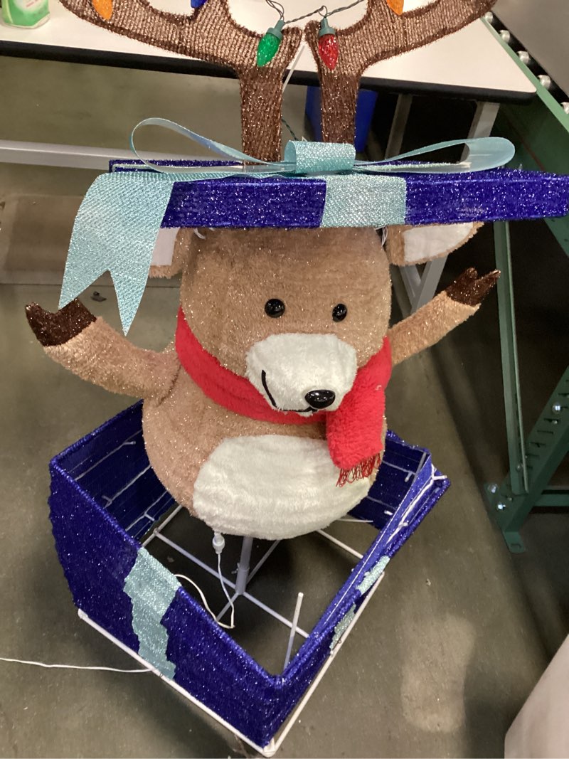 holiday living 4-ft animatronic led reindeer in giftbox yard decoration