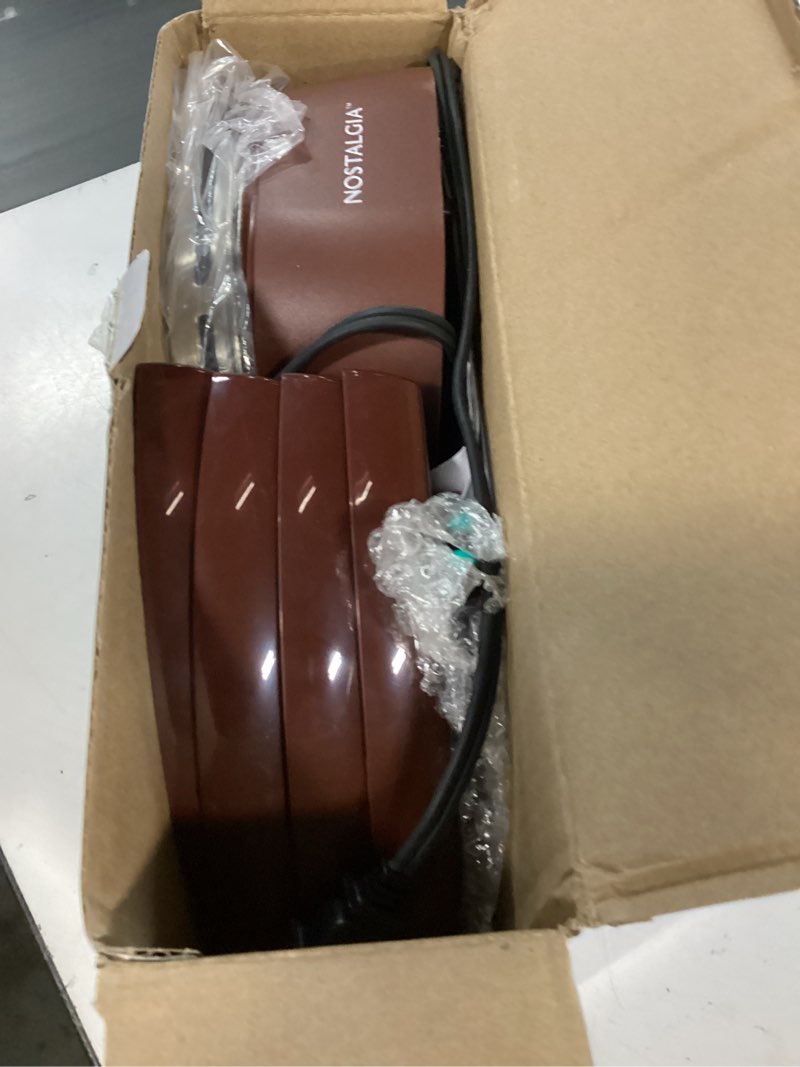 Condition photo showing Good Condition for nostalgia tabletop indoor electric s'mores maker - smores kit with marshmallow roasting sticks and 4 trays for graham crackers, chocolate, and marshmallows - movie night supplies - brown s'mores maker brown