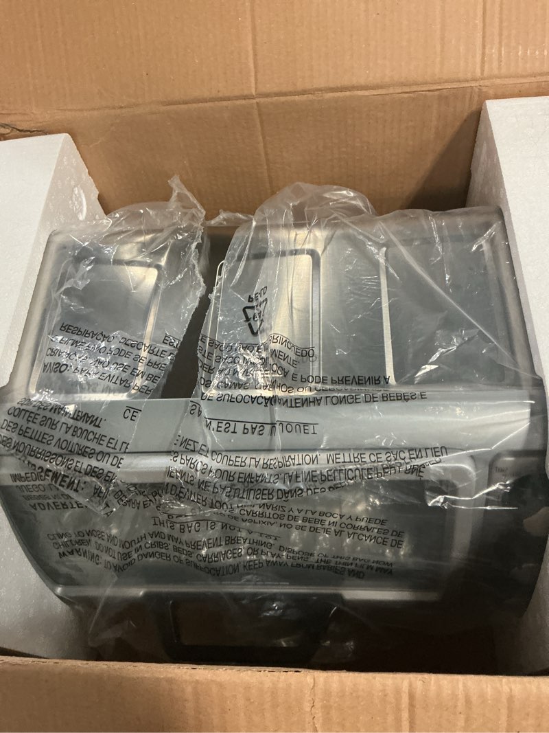 Condition photo showing As Is for Hamilton Beach 6 Slice Countertop Toaster Oven With Easy Reach Roll-Top Door, Bake, Broil & Toast Functions, Auto Shutoff, Silver (31127D)