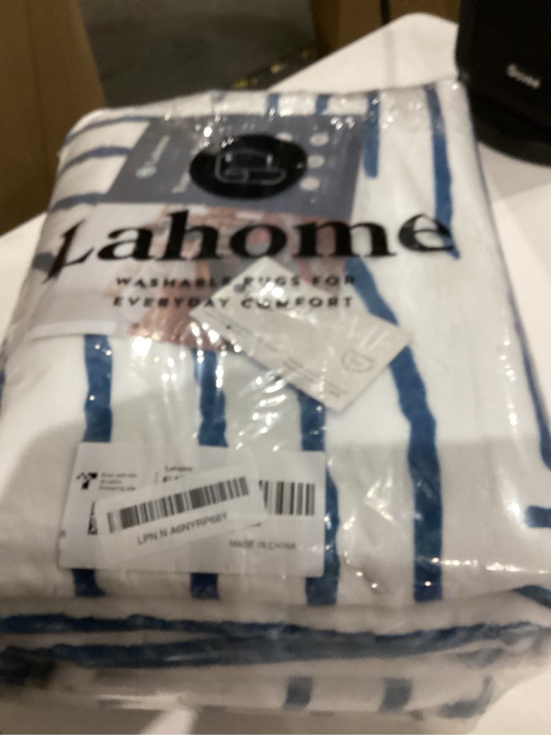 Condition photo showing Good Condition for Lahome Abstract Washable Area Rugs 5x7, Soft Blue Rugs for Living Room Ultra-Thin Non-Shedding Bedroom Rug, Modern Throw Rug Large Carpet for Dining Room Classroom Office(5'x7',Blue/White) Blue/White 5' x 7'