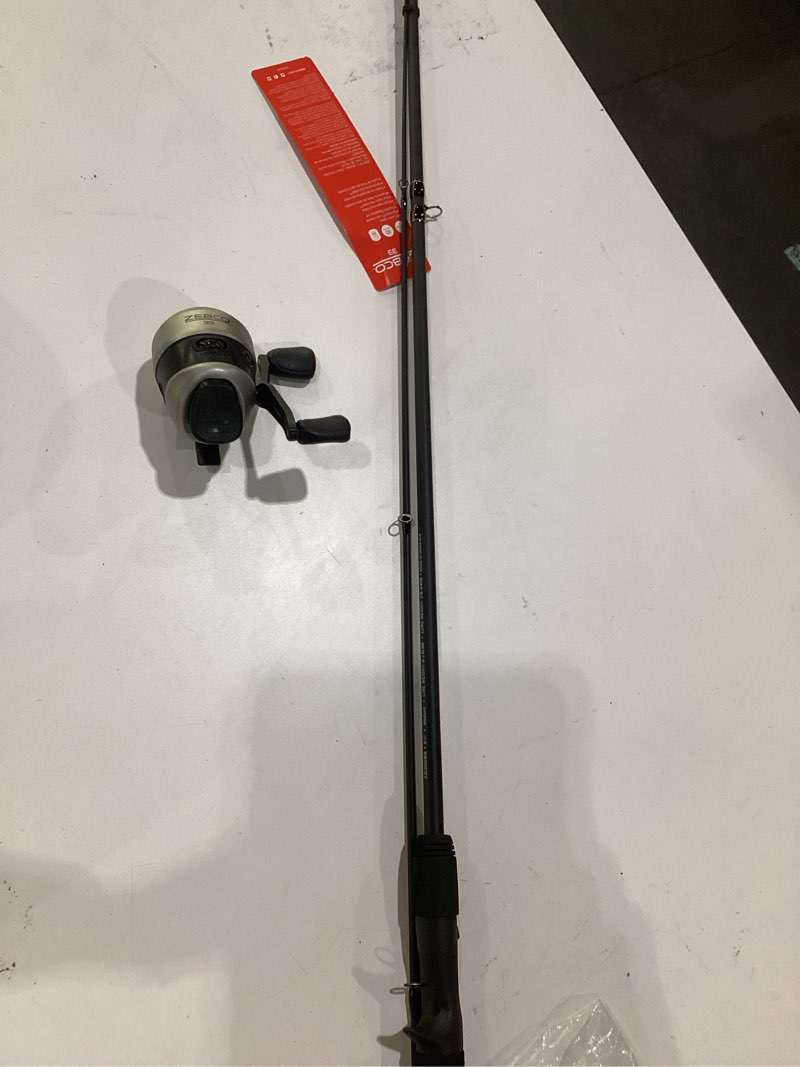 Condition photo showing As Is for zebco 33 spincast reel and fishing rod combo, 6-foot 2-piece fiberglass rod with eva handle, quickset anti-reverse fishing reel with bite alert 6 foot - spincast - silver/black
