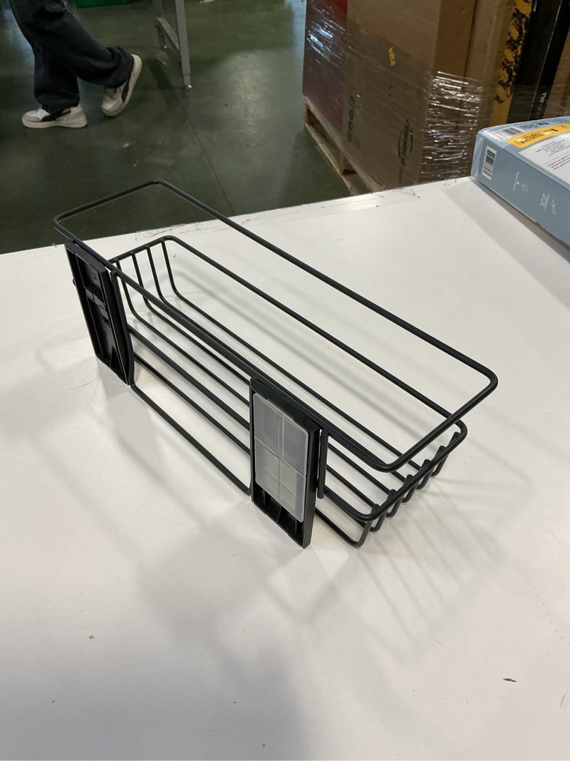Condition photo showing As Is for   matte black wire shower caddy 