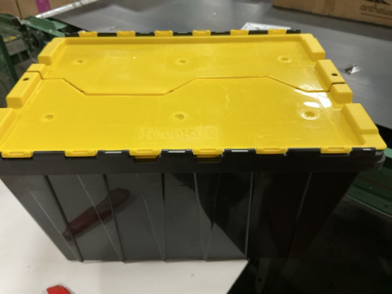 Condition photo showing Good Condition for akro-mils 66486 12-gallon plastic stackable storage keepbox tote container with attached hinged lid, 21-1/2-inch x 15-inch x 12-1/2-inch, black/yellow