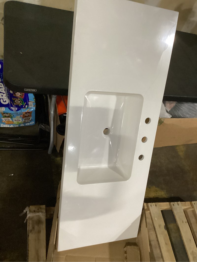 Condition photo showing As Is for (cracked) 18.265-in drop-in rectangular traditional white bathroom sink