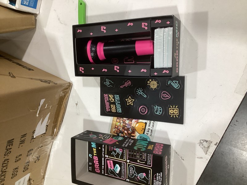 Condition photo showing New/Like New for Lucky Egg Official Grab The Mic – Family Karaoke Board Game w/Foam Mic, 8+ Ages, 2-10 Players - Games for Bad Singers w/ 240 Lyrics (120 Cards) (First Edition)