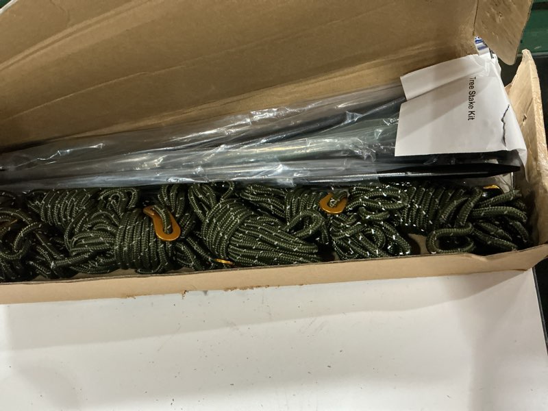 Condition photo showing New/Like New for heavy duty tree stake kits, 15.75 inch steel tree stakes and supports for young tree anti strong wind, leaning tree anchor straightening kit with 6pcs steel stakes, 13.12 feet rope and tree straps 15.75 inch 6 stakes