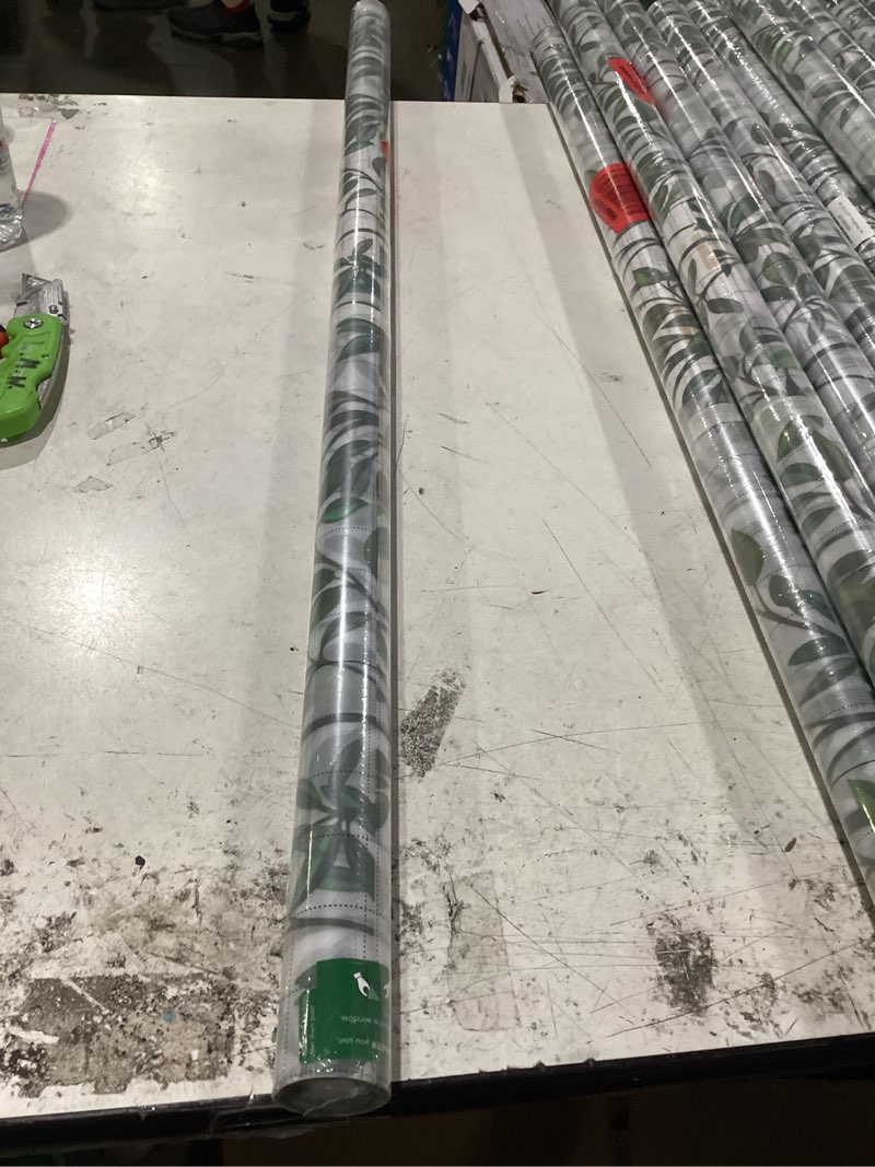 Condition photo showing New/Like New for window privacy film with cutting grid, non-adhesive stained glass window film decorative, static cling privacy window film, leafy rianbow, 35.4 inch x 78.7 inch leafy rianbow 35.4 inch * 78.7 inch