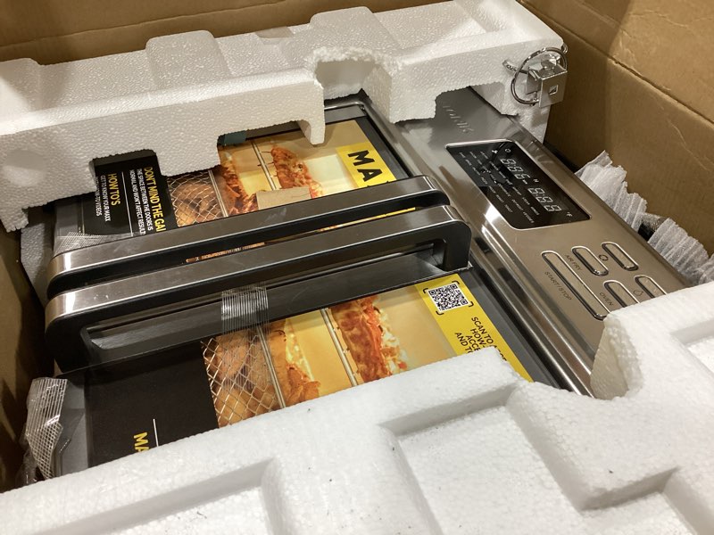 Condition photo showing Good Condition for kalorik maxx air fryer oven, 26 quart 10-in-1 countertop toaster oven & air fryer combo - fry, bake, roast, rotisserie, & more, large glass french doors & 9 accessories, 1700-watts, stainless steel