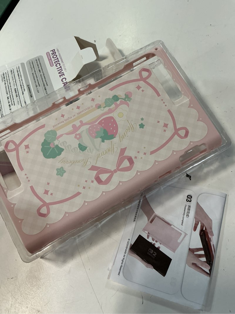 Condition photo showing Good Condition for geekshare strawberries with cream case compatible with switch 2, slim separable soft silicone protective shell with 2 thumb grip caps -- pink pink strawberries for switch 2
