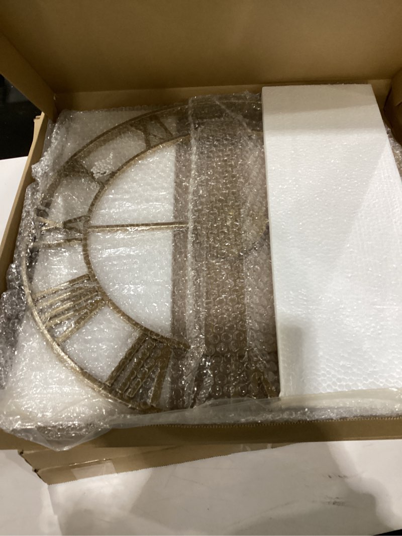 Condition photo showing New/Like New for Large Wall Clock 24 Inch Gold Roman Numerals Metal Clock Battery Operated Silent Non-Ticking Decor Clock Modern Round Oversize Wall Clocks for Home, Hotel, Office, Bedroom (Gold, 24inch) 24inch Gold
