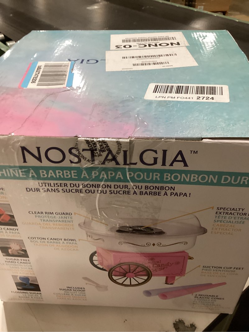 Condition photo showing New/Like New for Nostalgia Vintage Hard and Sugar Free Candy Countertop Cotton Candy Maker, Includes 2 Reusable Cones And Sugar Scoop – Pink