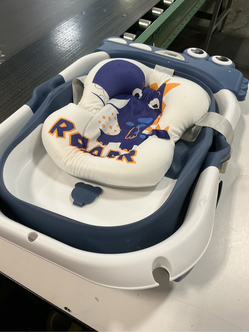 Condition photo showing As Is for MoreFeel Collapsible Baby Bathtub for Newborn with Thermometer & 1 Hooded Towel & 1 Soft Floating Cushion,Portable Travel Bathtub with Drain Hole, Durable Foldable Baby Tubs for Infants to Toddler Alligator like Navy Blue
