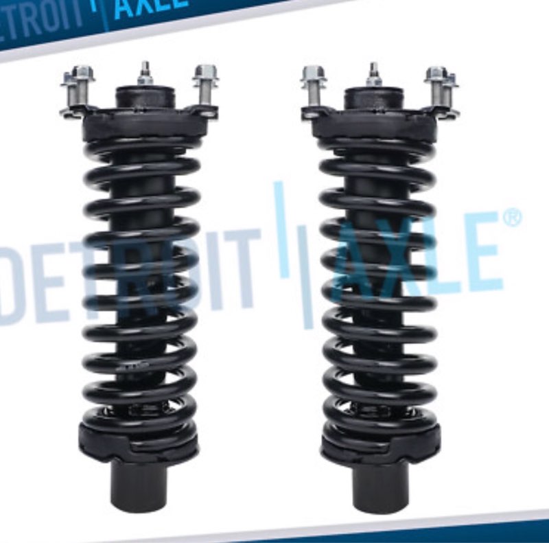 pair front struts w/coil spring assembly