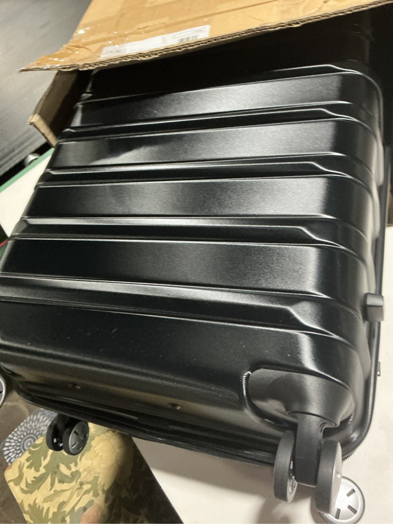Condition photo showing As Is for Samsonite Omni 2 24-Inch Medium Checked Hardside Luggage with 360° Spinner Wheels - Scratch Resistant Hardshell - TSA Lock - Expandable Polycarbonate Shell for Lightweight Travel - Midnight Black Checked-Medium Spinner Midnight Black