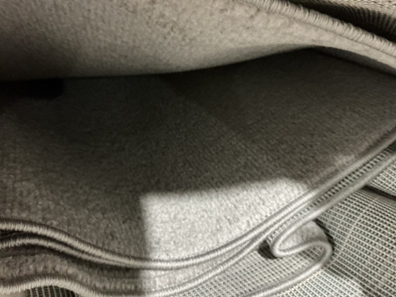 Condition photo showing As Is for Nourison Essentials Indoor/Outdoor Silver Grey 8' x 10' Area Rug, Easy Cleaning, Non Shedding, Bed Room, Living Room, Dining Room, Backyard, Deck, Patio (8x10)